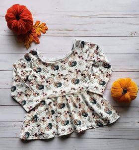 Thankful Long Sleeved Peplum